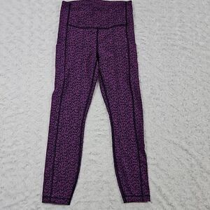 Athleta salutation stash pocket II purple and black printed 7/8 tight womens XS
